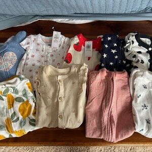 Baby bundle of Jammie’s/outfits newborn and 0-3